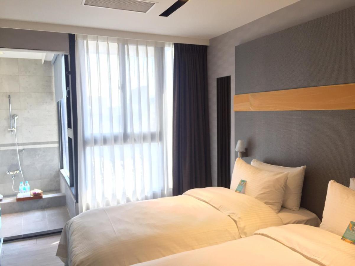 Fengjia Hotel Bell Тайчжун Экстерьер фото
