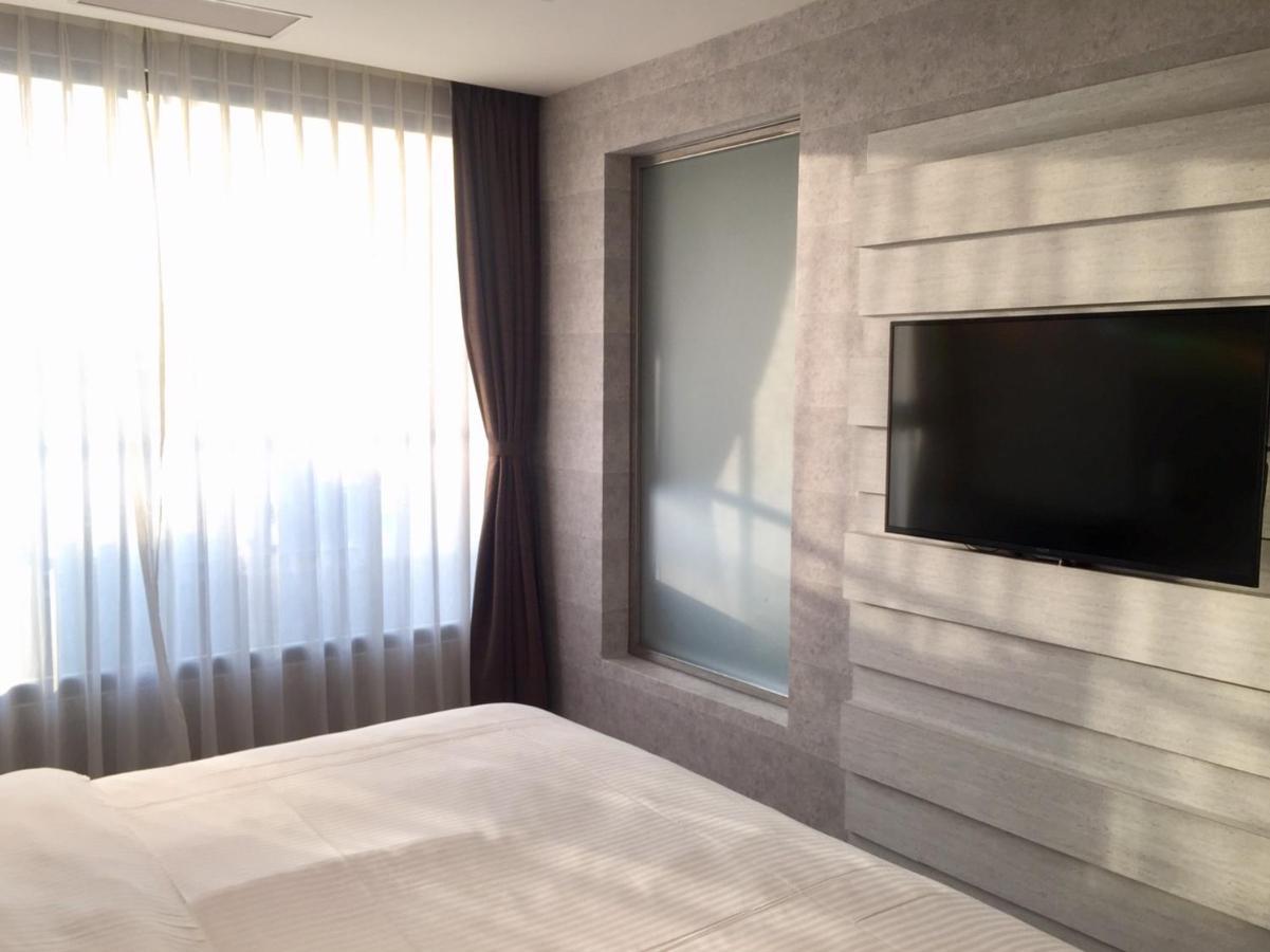Fengjia Hotel Bell Тайчжун Экстерьер фото