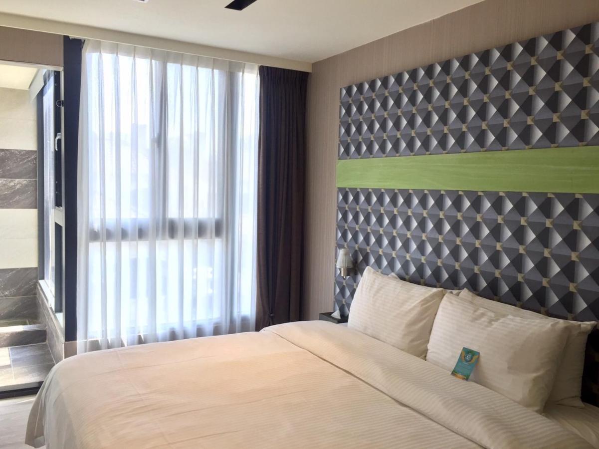 Fengjia Hotel Bell Тайчжун Экстерьер фото